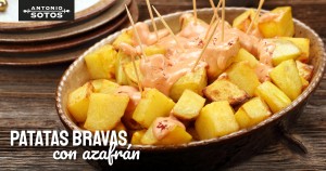 Patatas bravas con alioli de azafrán